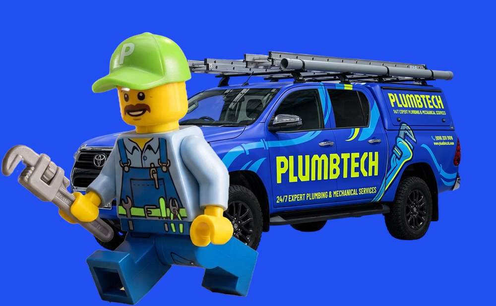 Plumb Tech plumber with the branded ute